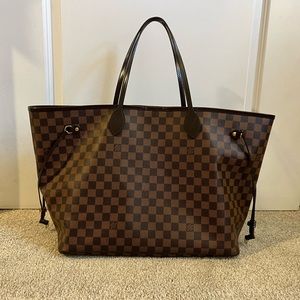 Barely used Neverfull GM. Includes box and dust bag. Retails for $2100.